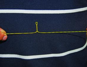 The doubled up two-strand section is being twisted into a four-strand section. 